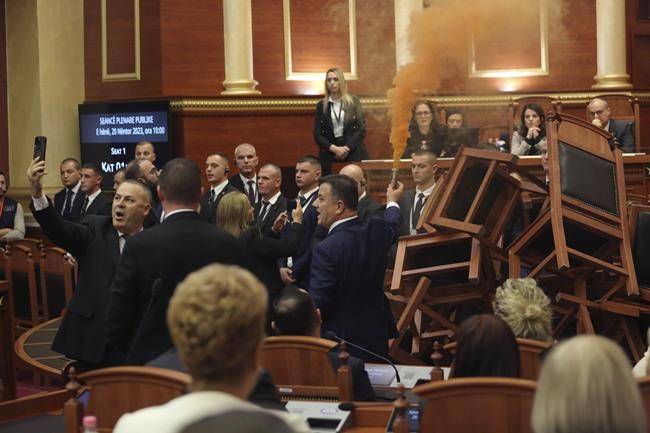 The Albanian opposition disrupts a Parliament vote on the budget with flares and piled-up chairs | iNFOnews.ca The Albanian opposition disrupts a Parliament vote on the budget with flares and piled-up chairs | iNFOnews.ca