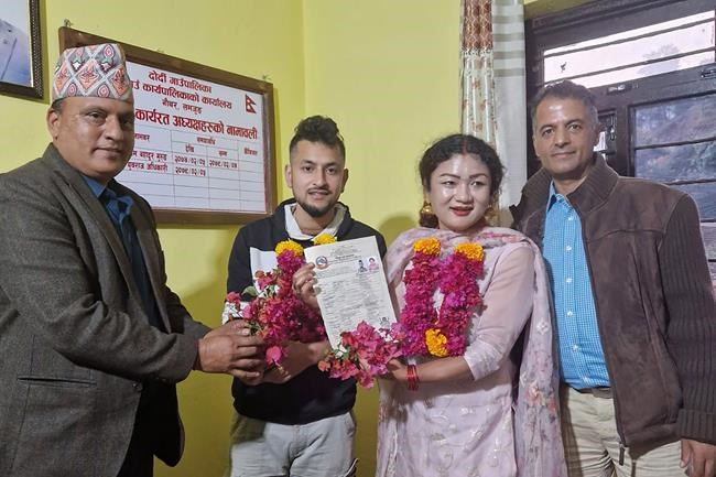 Gay couple in Nepal becomes the 1st to officially register same-sex marriage in the country | iNFOnews.ca