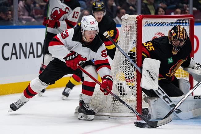 Bratt spoils Canucks' comeback as Devils win 'Hughes Bowl' 6-5 | iNFOnews.ca