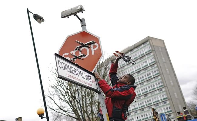 Suspect arrested in alleged theft of a Banksy stop sign decorated with military drones | iNFOnews.ca