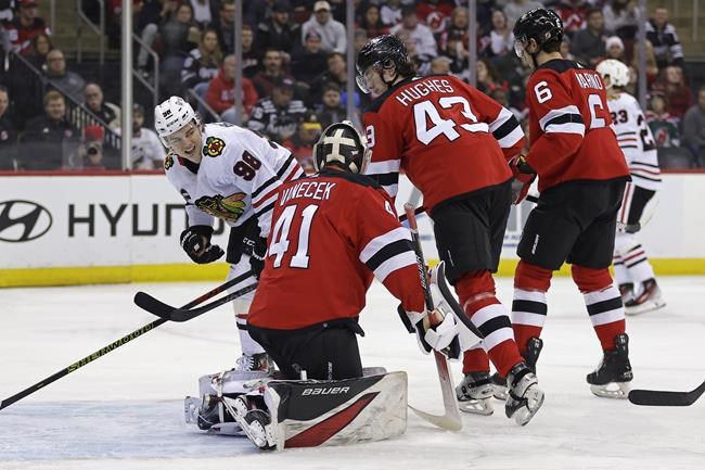 Connor Bedard leaves after Brendan Smith hit as Chicago Blackhawks lose 4-2 to New Jersey Devils | iNFOnews.ca