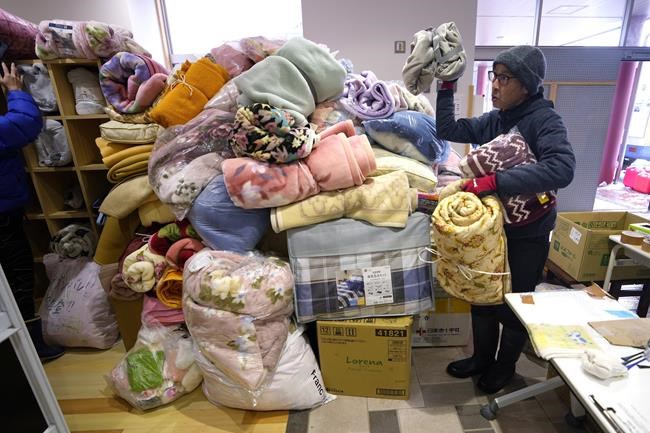 Snow hinders rescues and aid deliveries to isolated communities after Japan quakes kill 161 people | iNFOnews.ca