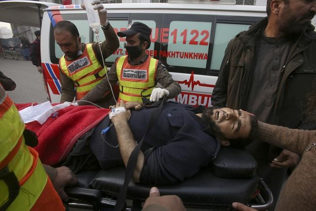 Suspected militants kill 2 police officers assigned to protect polio workers in northwest Pakistan | iNFOnews.ca