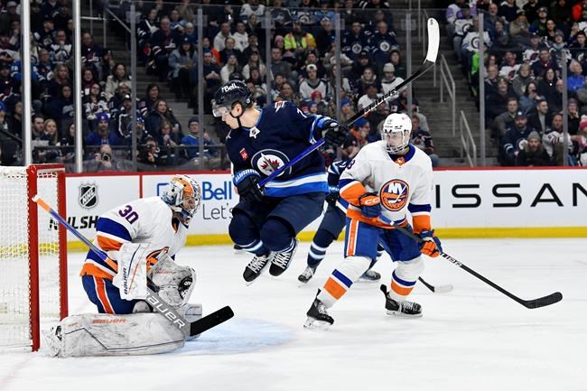 Hellebuyck helps Jets knock off Islanders 4-2 | iNFOnews.ca Hellebuyck helps Jets knock off Islanders 4-2 | iNFOnews.ca