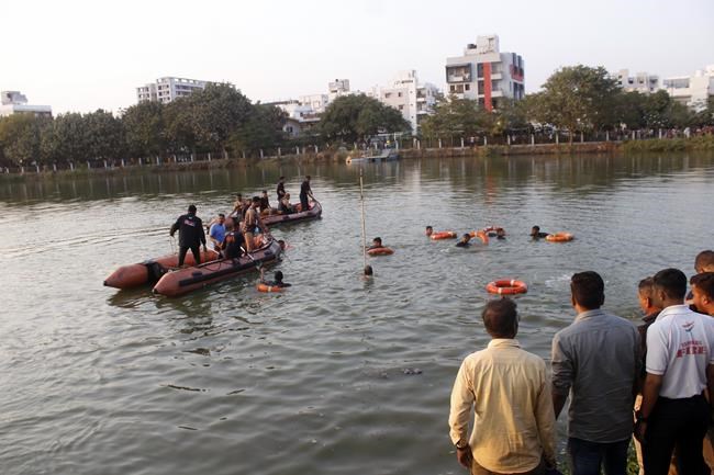 15 students and 1 teacher drown when a boat capsizes in a lake in western India | iNFOnews.ca