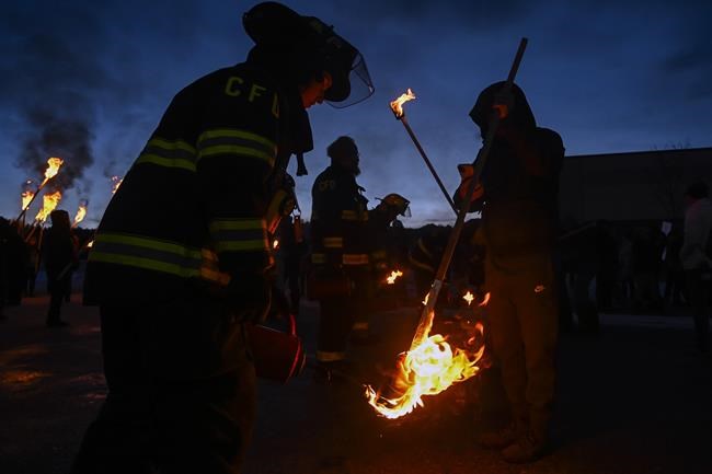 'Burn, beetle, burn': Hundreds of people torch an effigy of destructive bug in South Dakota town | iNFOnews.ca