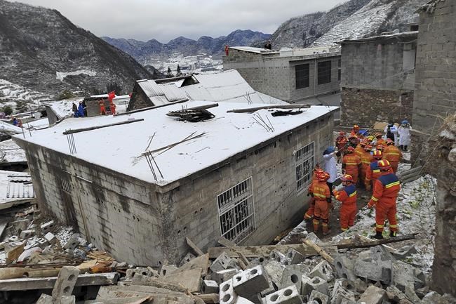 Two survivors rescued after landslide buried homes in freezing weather in southwest China, 11 died | iNFOnews.ca