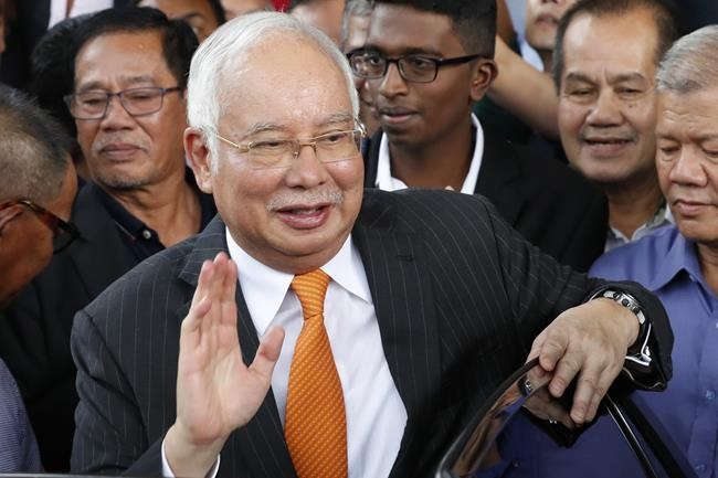 Malaysia halves prison term for ex-Prime Minister who oversaw multibillion-dollar 1MDB thefts | iNFOnews.ca