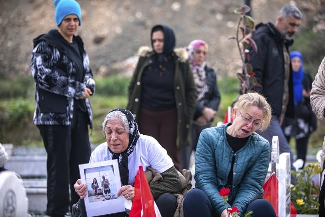 Turkey mourns its tens of thousands dead, surrounded by the ruins of last year's earthquake | iNFOnews.ca