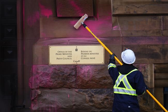 Five climate protesters arrested after pink paint splashed on PM's office building | iNFOnews.ca Five climate protesters arrested after pink paint splashed on PM's office building | iNFOnews.ca