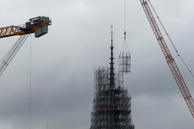 Notre Dame cathedral's spire revealed in Paris as reconstruction continues after fire | iNFOnews.ca
