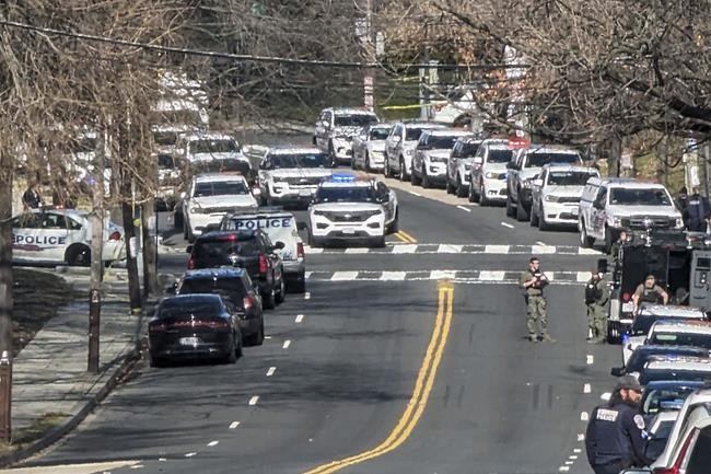 3 officers shot in Washington, leading to daylong standoff before suspect's arrest | iNFOnews.ca