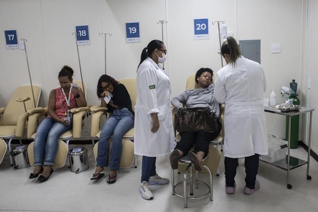 Brazil's health agents scour junkyards and roofs for mosquitos to fight dengue epidemic | iNFOnews.ca