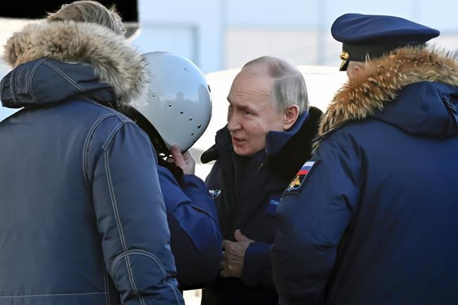 Putin takes a flight in nuclear-capable bomber in a tough message to the West ahead of election | iNFOnews.ca Putin takes a flight in nuclear-capable bomber in a tough message to the West ahead of election | iNFOnews.ca