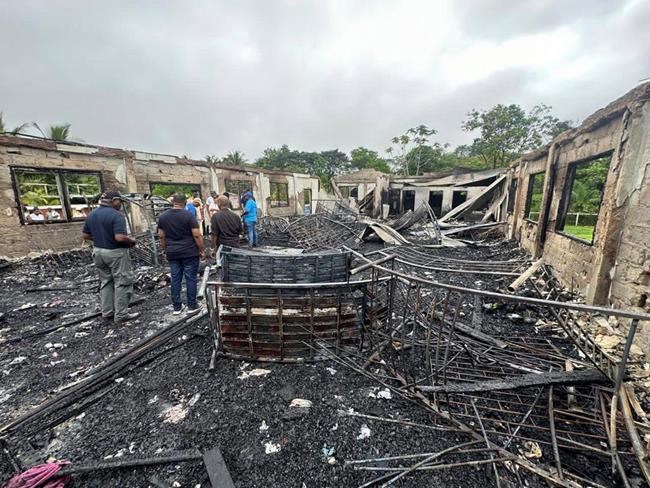 Parents of two girls who survived a dorm fire that killed 20 in Guyana sue the government | iNFOnews.ca Parents of two girls who survived a dorm fire that killed 20 in Guyana sue the government | iNFOnews.ca