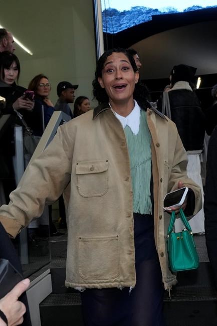 Prada gives new meaning to bows and aprons, historic elements of women's wardrobe, for next season | iNFOnews.ca Prada gives new meaning to bows and aprons, historic elements of women's wardrobe, for next season | iNFOnews.ca