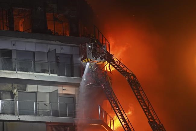 Fire engulfs 2 buildings in Spanish city of Valencia, killing at least 4 people. Nearly 20 missing | iNFOnews.ca Fire engulfs 2 buildings in Spanish city of Valencia, killing at least 4 people. Nearly 20 missing | iNFOnews.ca