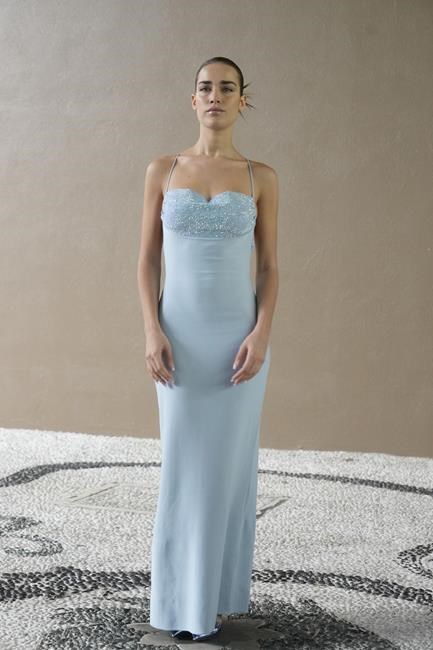 Armani offers hope for a better season with winter flowers as he closes Milan Fashion Week | iNFOnews.ca Armani offers hope for a better season with winter flowers as he closes Milan Fashion Week | iNFOnews.ca