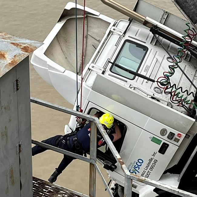 The semi driver rescued dangling from a bridge had been struck by an oncoming vehicle: mayor | iNFOnews.ca The semi driver rescued dangling from a bridge had been struck by an oncoming vehicle: mayor | iNFOnews.ca