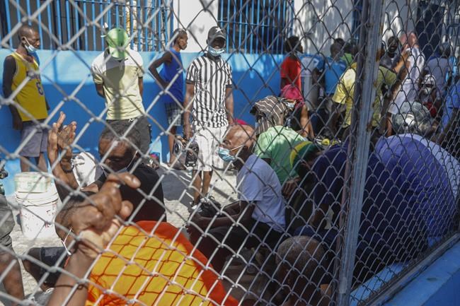Haiti declares a curfew as it tries to restore order after weekend jailbreak, explosion of violence | iNFOnews.ca