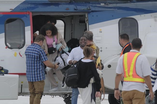 As gangs rampage through Haiti's capital, more than 33,000 people have fled in 13 days, report finds | iNFOnews.ca