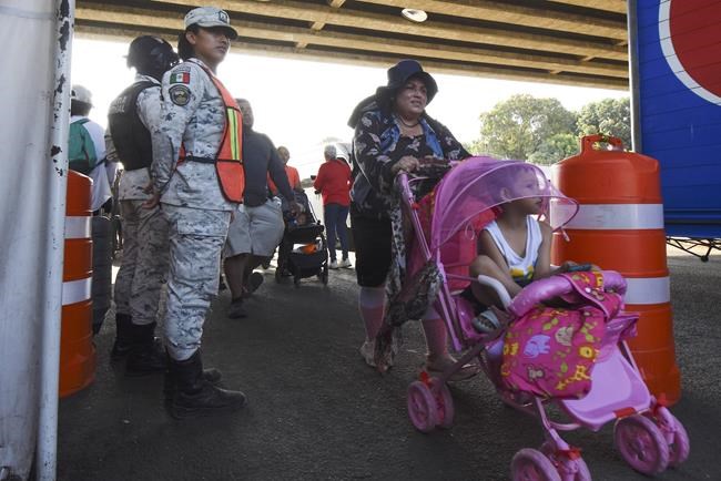 About 2,000 migrants begin a Holy Week walk in southern Mexico to raise awareness of their plight | iNFOnews.ca About 2,000 migrants begin a Holy Week walk in southern Mexico to raise awareness of their plight | iNFOnews.ca