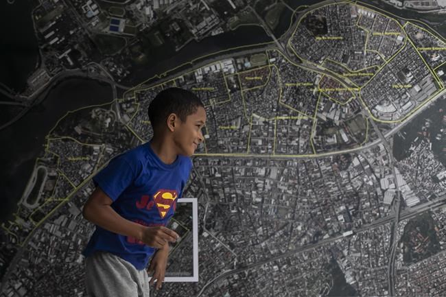 Book of kids' drawings reflect regular violence shaping their lives in a Rio de Janeiro favela | iNFOnews.ca