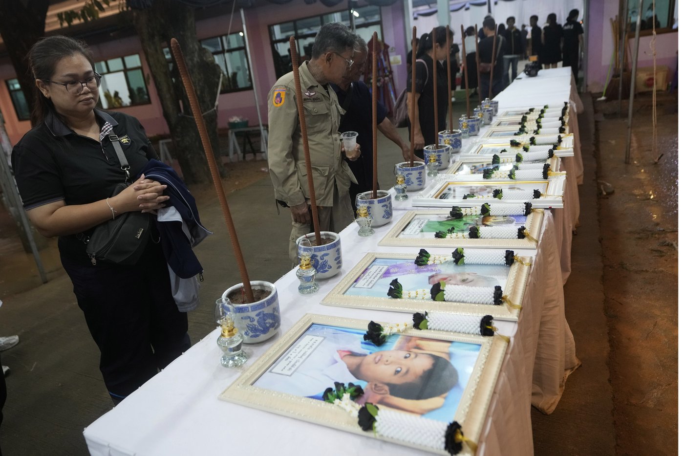Memories and prayers are shared at a small-town funeral for the victims of horrific Thai bus fire | iNFOnews.ca Memories and prayers are shared at a small-town funeral for the victims of horrific Thai bus fire | iNFOnews.ca