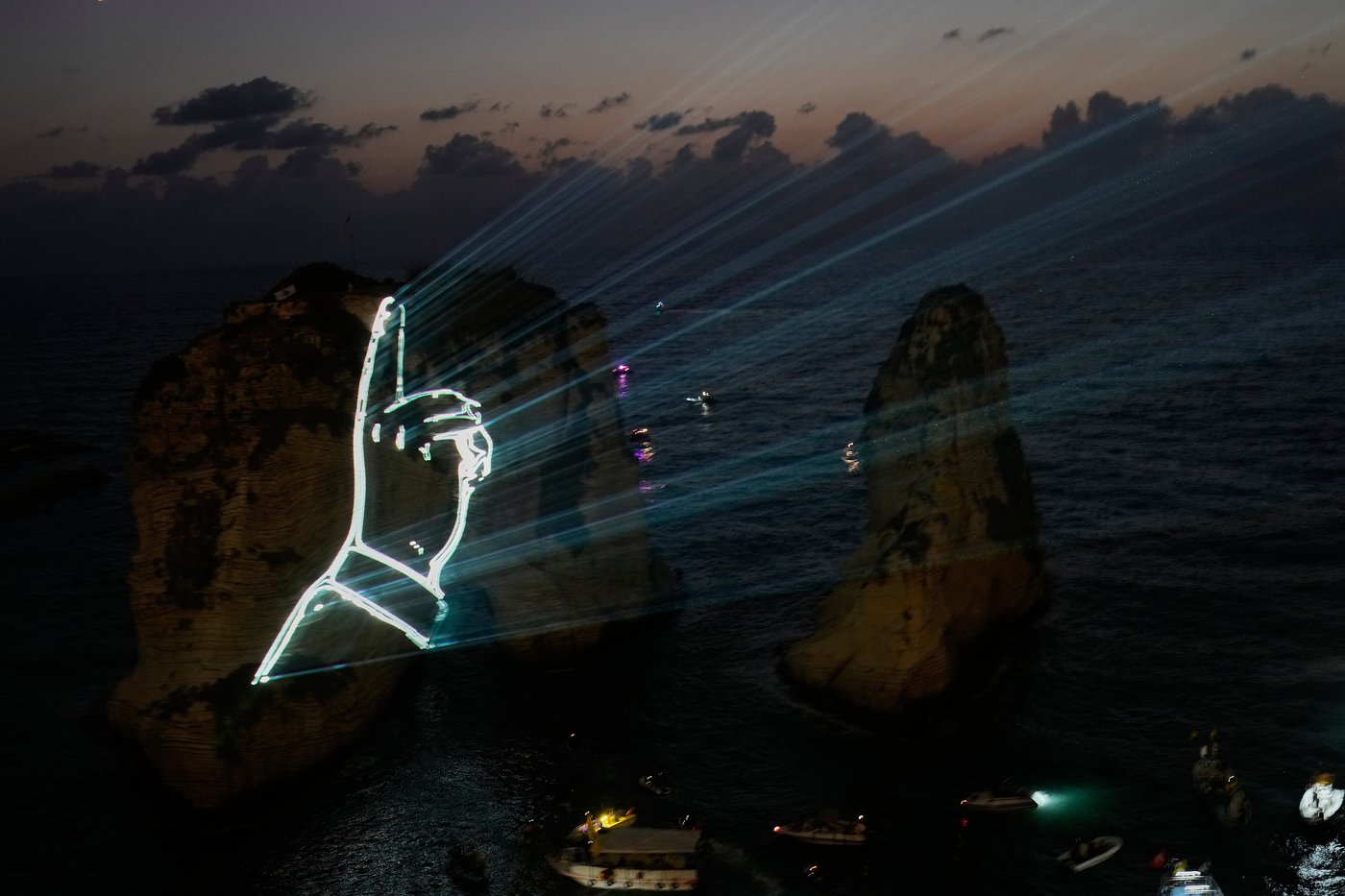 Hezbollah defies Lebanon PM's ban to honor fallen leaders with coastal light show | iNFOnews.ca Hezbollah defies Lebanon PM's ban to honor fallen leaders with coastal light show | iNFOnews.ca