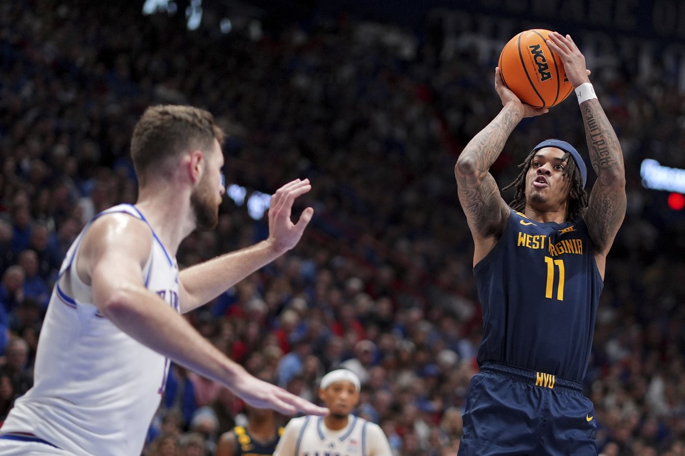 Plane trouble and injuries? West Virginia leans into 'No Excuses' mantra for 62-61 win at No. 7 KU | iNFOnews.ca Plane trouble and injuries? West Virginia leans into 'No Excuses' mantra for 62-61 win at No. 7 KU | iNFOnews.ca