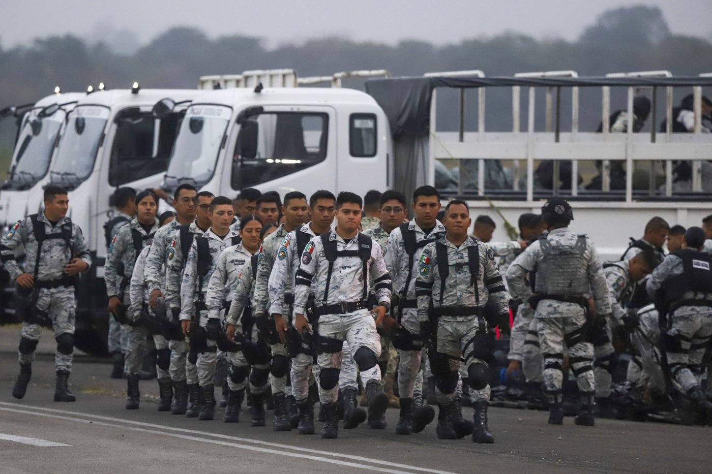 Mexico deploys the first of 10,000 National Guard troops to US border after Trump's tariff threat | iNFOnews.ca Mexico deploys the first of 10,000 National Guard troops to US border after Trump's tariff threat | iNFOnews.ca