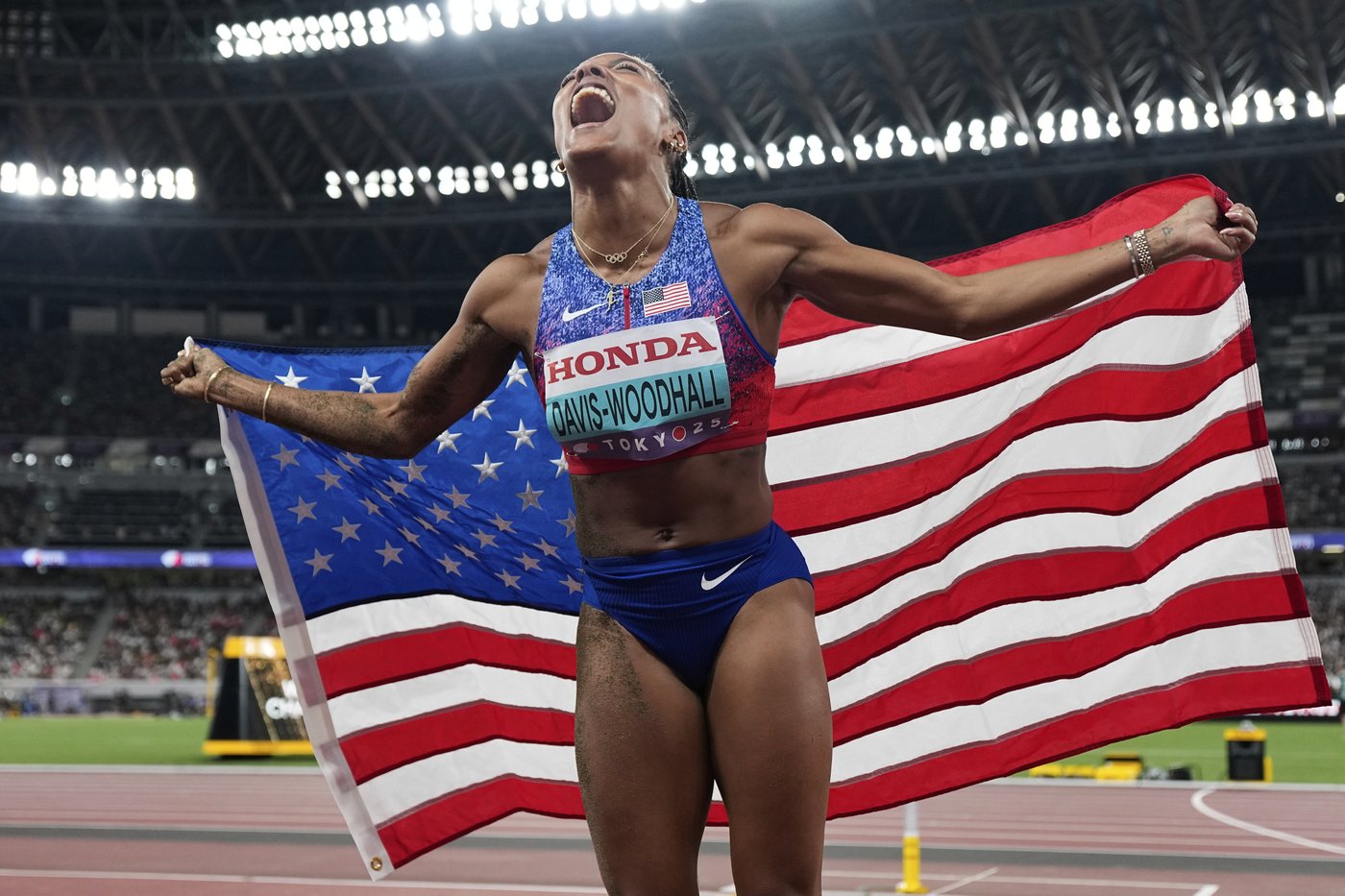 Long jumper Tara Davis-Woodhall explains tears during national anthem: 'I do believe in my country' | iNFOnews.ca
