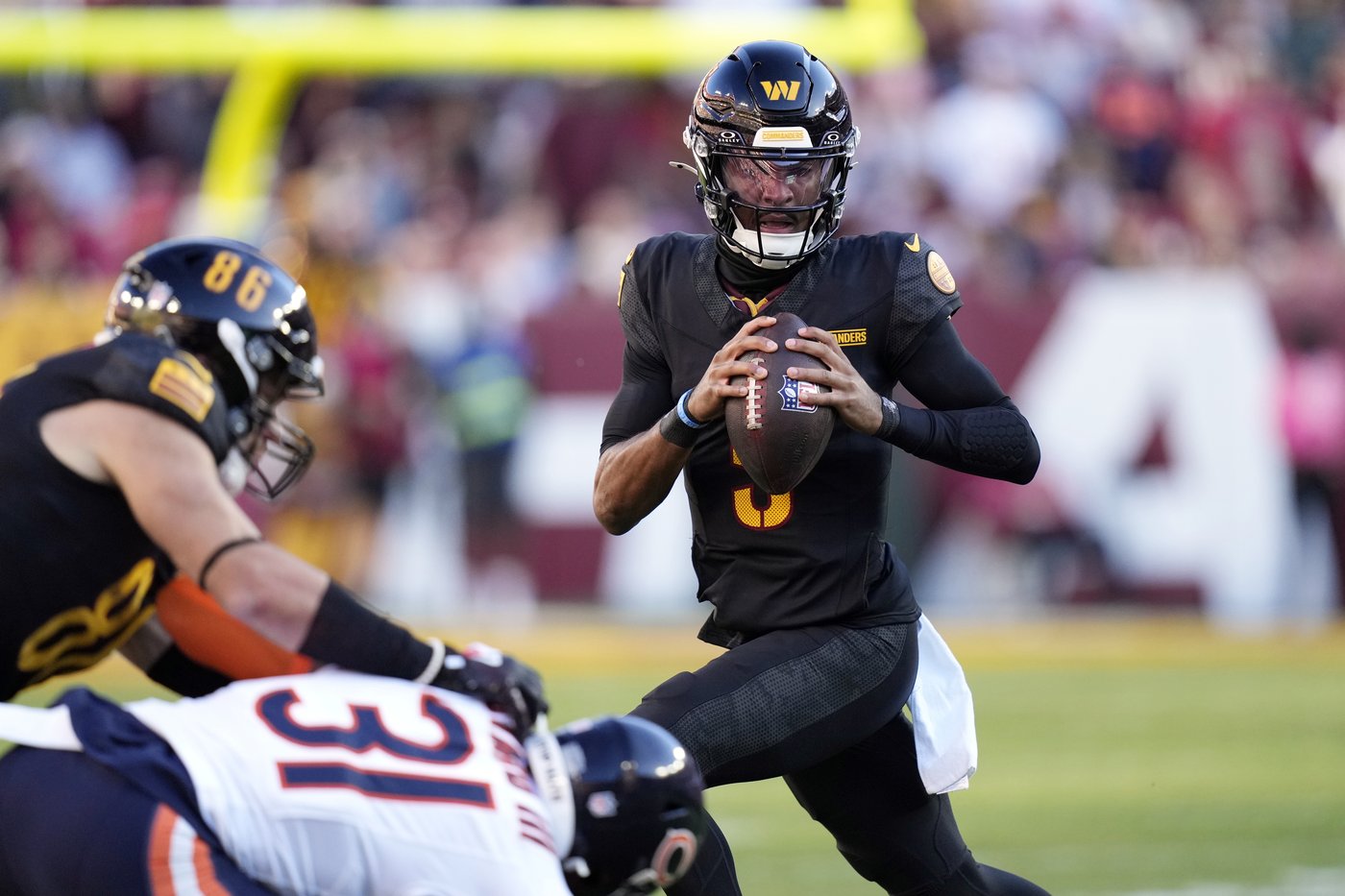 Commanders QB Jayden Daniels takes more hits but shrugs off rib injury and throws winning Hail Mary | iNFOnews.ca Commanders QB Jayden Daniels takes more hits but shrugs off rib injury and throws winning Hail Mary | iNFOnews.ca
