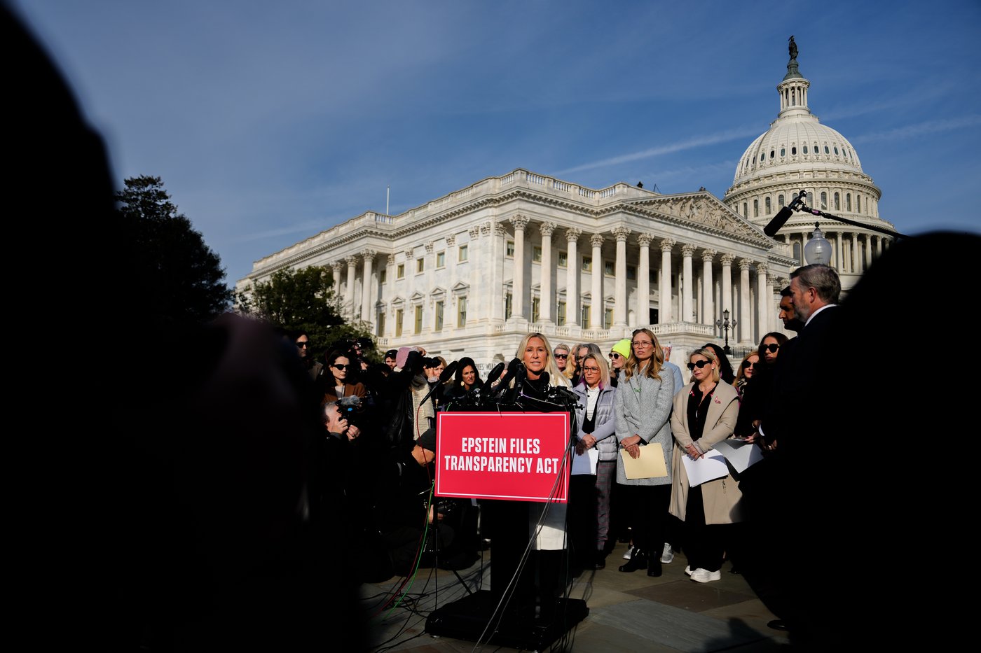 Photos of Marjorie Taylor Greene standing with Epstein survivors before House votes on Epstein files | iNFOnews.ca