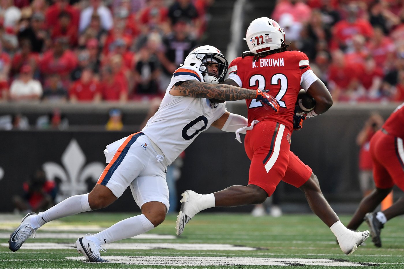 Taylor's OT run lifts No. 24 Virginia to a 30-27 victory over Louisville | iNFOnews.ca Taylor's OT run lifts No. 24 Virginia to a 30-27 victory over Louisville | iNFOnews.ca