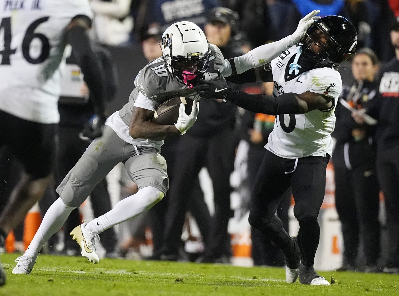 Shedeur Sanders, Travis Hunter help Colorado beat Cincinnati 34-23 to become bowl eligible | iNFOnews.ca