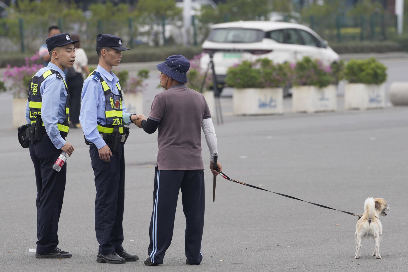 Silence descends around China’s deadliest mass killing in years as flowers cleared away | iNFOnews.ca