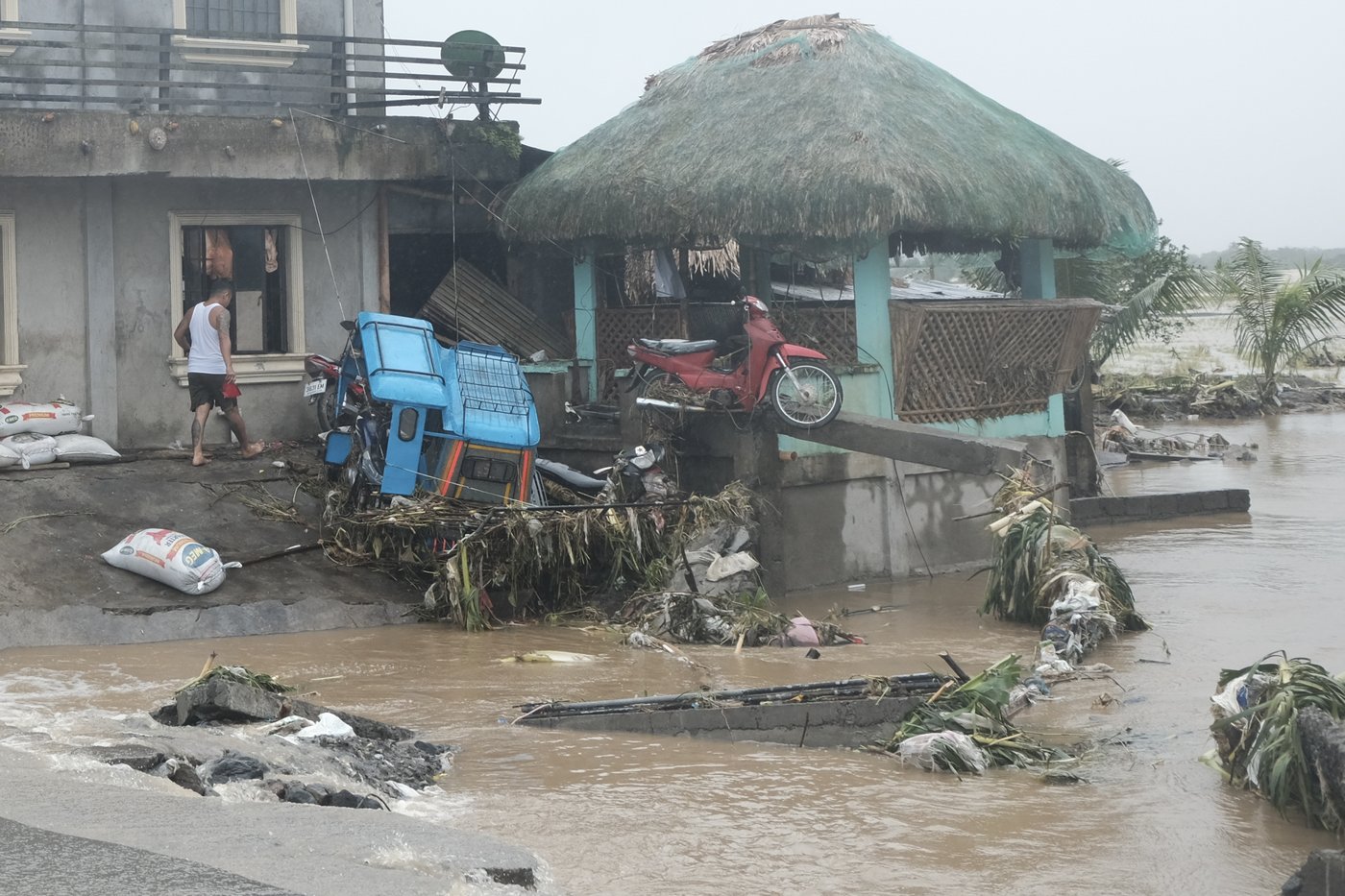 Tropical storm battering Philippines leaves at least 24 people dead in flooding and landslides | iNFOnews.ca Tropical storm battering Philippines leaves at least 24 people dead in flooding and landslides | iNFOnews.ca