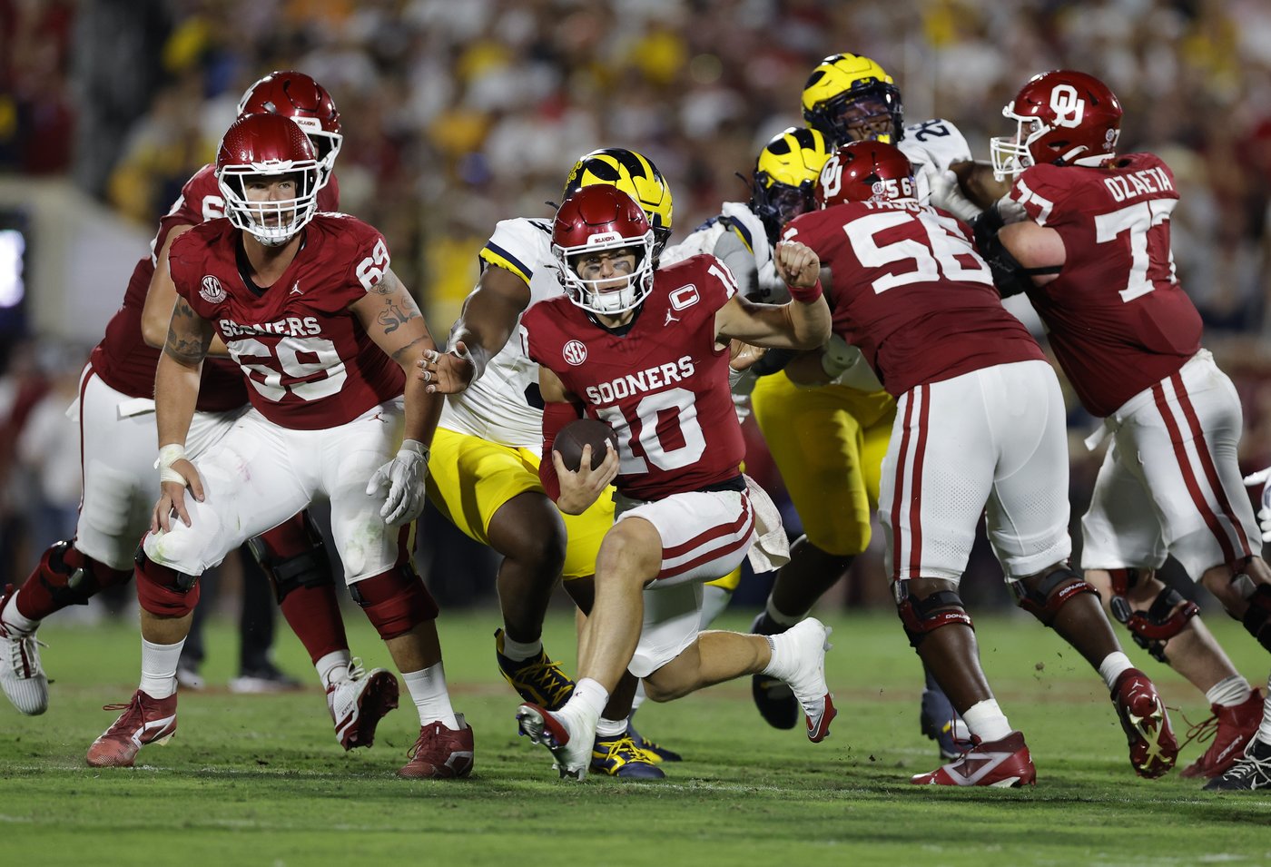 John Mateer has 2 TDs rushing, 1 passing as No. 18 Oklahoma beats No. 15 Michigan 24-13 | iNFOnews.ca John Mateer has 2 TDs rushing, 1 passing as No. 18 Oklahoma beats No. 15 Michigan 24-13 | iNFOnews.ca
