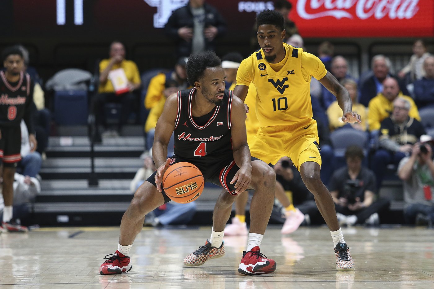 Cryer scores 17 to lead No. 6 Houston past West Virginia 63-49 for 13th straight win | iNFOnews.ca Cryer scores 17 to lead No. 6 Houston past West Virginia 63-49 for 13th straight win | iNFOnews.ca