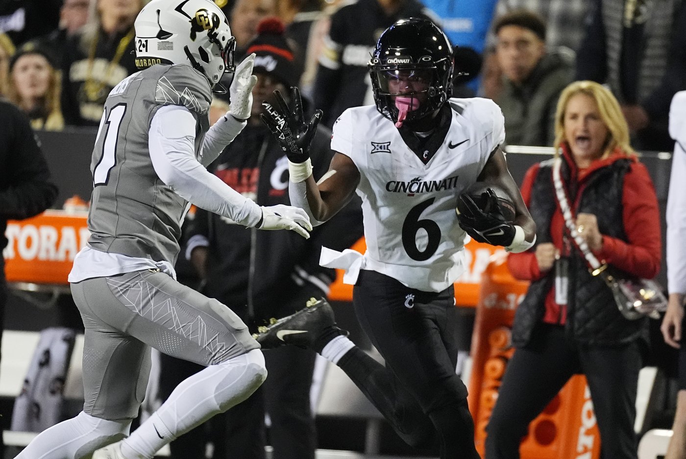 Shedeur Sanders, Travis Hunter help Colorado beat Cincinnati 34-23 to become bowl eligible | iNFOnews.ca