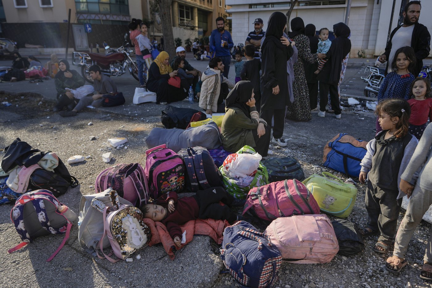 Hundreds of fleeing families sleep on beaches and streets after Israel's strikes shake Beirut | iNFOnews.ca Hundreds of fleeing families sleep on beaches and streets after Israel's strikes shake Beirut | iNFOnews.ca