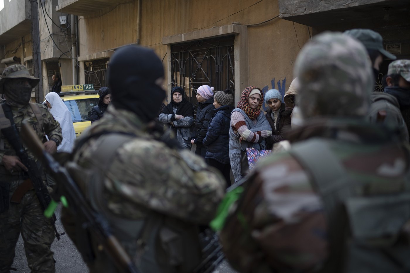 AP PHOTOS: Syria's new security forces conduct sweeps in Homs, looking for ousted Assad's loyalists | iNFOnews.ca