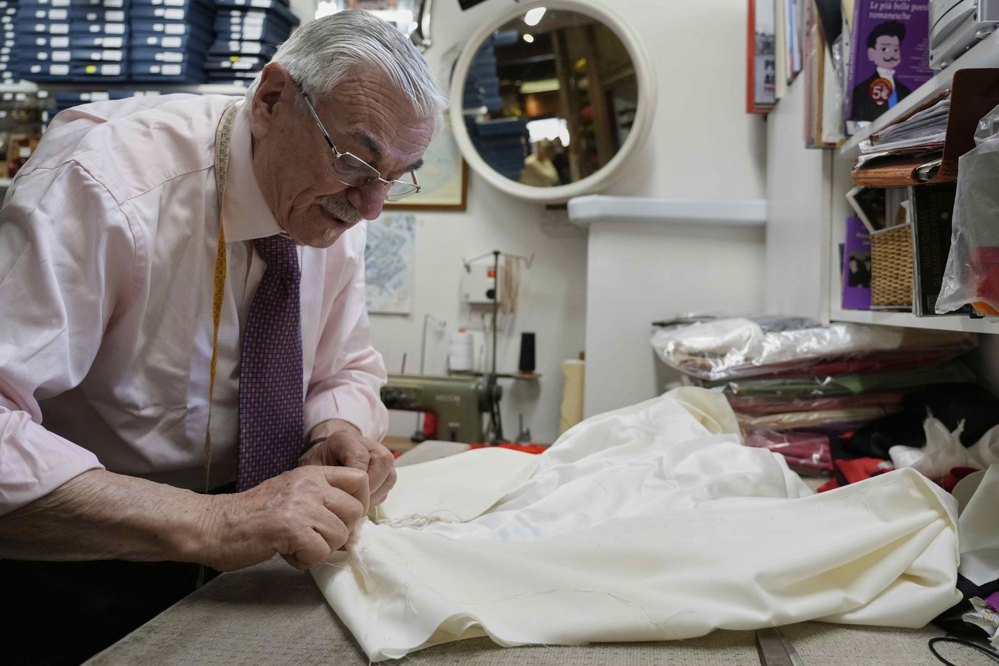 These papal tailors aren't expecting a traditional order for new cassocks to outfit the next pope | iNFOnews.ca