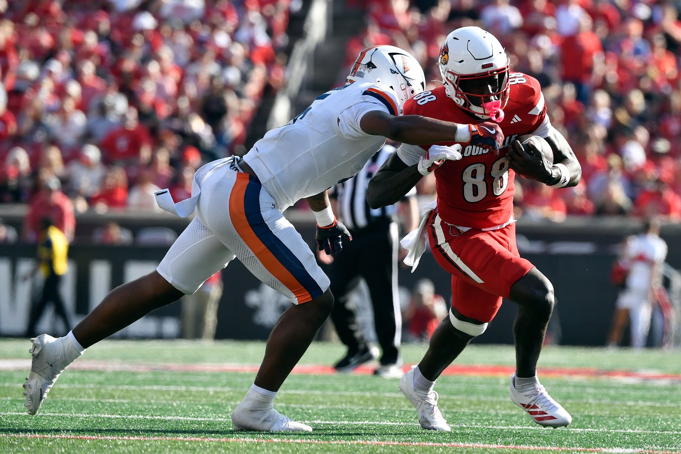 Taylor's OT run lifts No. 24 Virginia to a 30-27 victory over Louisville | iNFOnews.ca Taylor's OT run lifts No. 24 Virginia to a 30-27 victory over Louisville | iNFOnews.ca