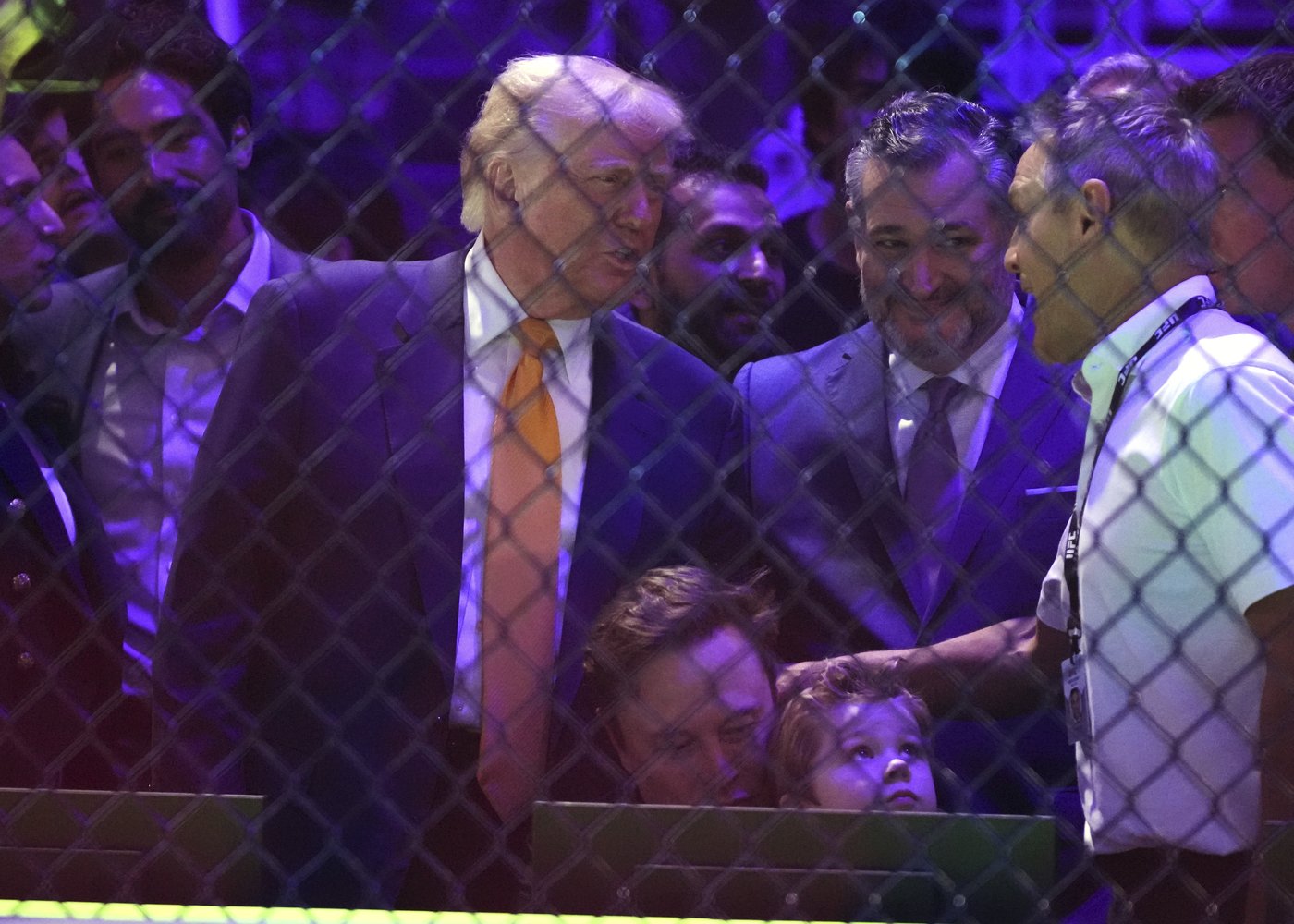 Trump sits cageside at Miami UFC event in his latest appearance at a sports event | iNFOnews.ca