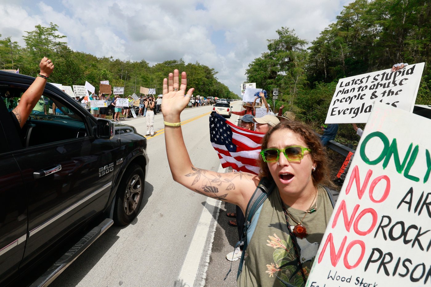 Protesters line highway in Florida Everglades to oppose 'Alligator Alcatraz' | iNFOnews.ca