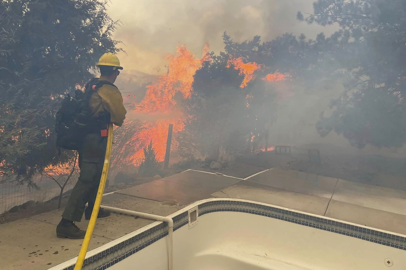 Aided by rain, crews extinguish a wildfire in Nevada after 1 home burns | iNFOnews.ca