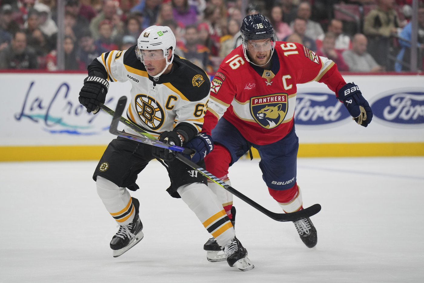 Bennett scores twice, Panthers open their title defense by getting past rival Bruins 6-4 | iNFOnews.ca