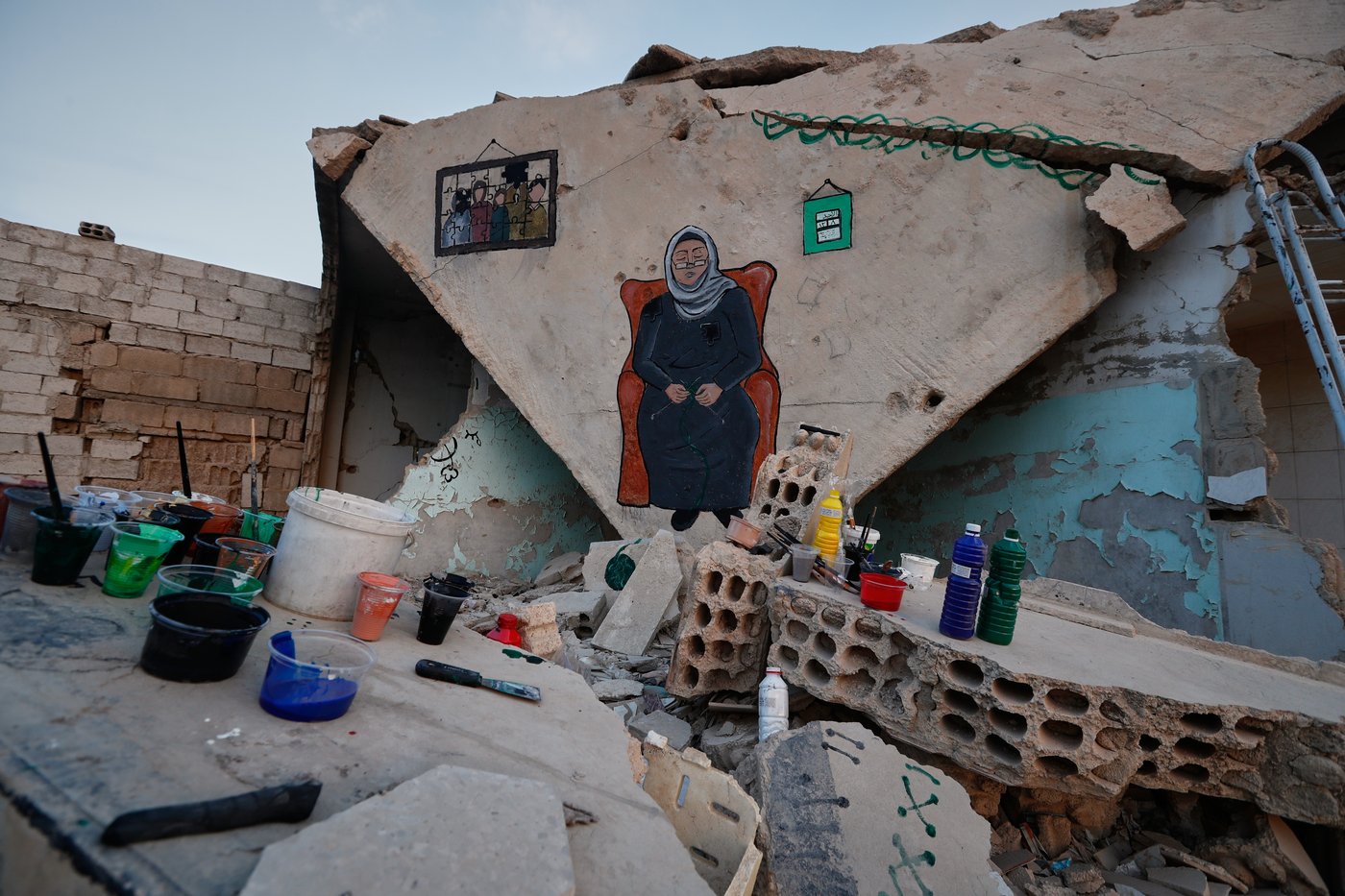 Syrian artists transform bombed-out house into a mural of remembrance, in photos | iNFOnews.ca